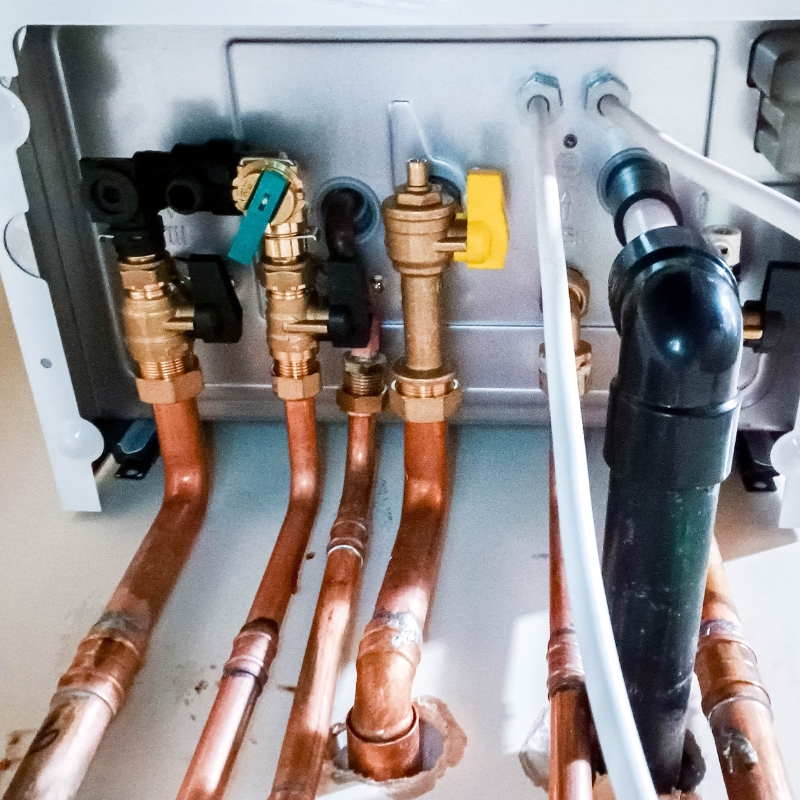 Copper gas pipes and valves professionally installed, demonstrating precise Gas Plumbing Sydney services for efficient and safe gas systems.